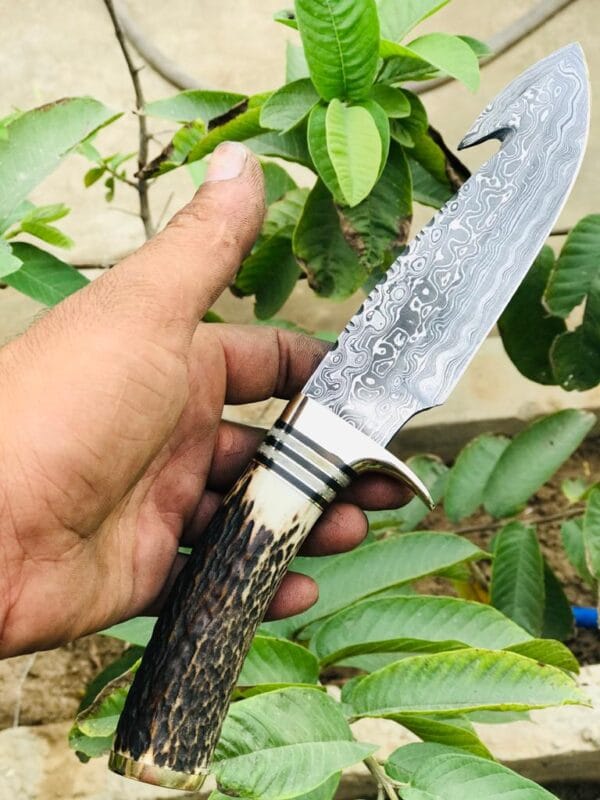 Custom Hand hunting knife with antler handle and brass guard
